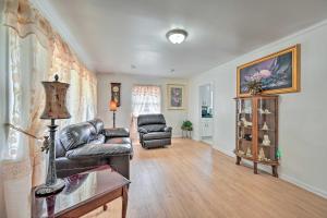 a living room with a couch and two chairs at Greensboro Home Less Than 4 Mi to Downtown! in Greensboro