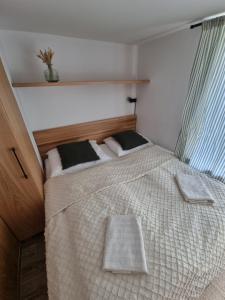 Posteľ alebo postele v izbe v ubytovaní Holiday house Laura