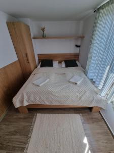 Posteľ alebo postele v izbe v ubytovaní Holiday house Laura
