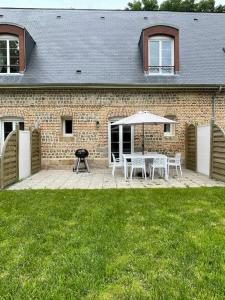 Vonkajšia záhrada v ubytovaní D2 CHARMANT duplex proche de la mer, avec jardin