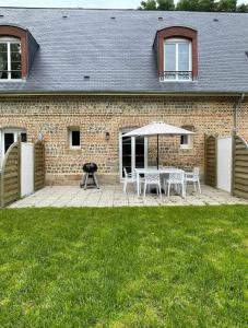 Vonkajšia záhrada v ubytovaní D2 CHARMANT duplex proche de la mer, avec jardin