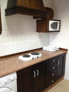 Кухня или кухненски бокс в Cortijo Cabañas Apartamentos Rurales
