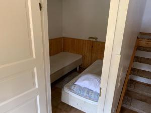Postel nebo postele na pokoji v ubytování Mökki Tikkala Taivalkoski