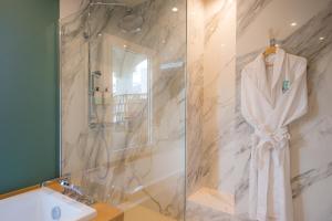 Ein Badezimmer in der Unterkunft La Pagerie - Tropical Garden Hotel