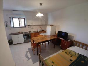 Kuchyň nebo kuchyňský kout v ubytování Apartments Bubica