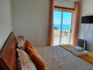 Ένα ή περισσότερα κρεβάτια σε δωμάτιο στο Casa Celia