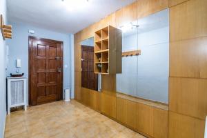 A kitchen or kitchenette at tuGuest Manuel de Falla Apartment
