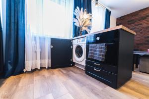 Η κουζίνα ή μικρή κουζίνα στο Apartament Sienkiewicza
