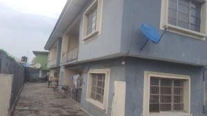 a building with a blue object on the side of it at Impeccable 3-Bed Apartment Located in Lagos in Lagos