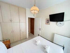 Posteľ alebo postele v izbe v ubytovaní Nafplio Downtown Apartment