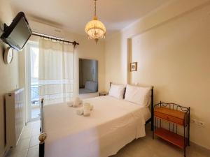 Posteľ alebo postele v izbe v ubytovaní Nafplio Downtown Apartment