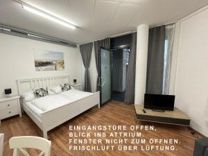 Rúm í herbergi á Berger Zentrum