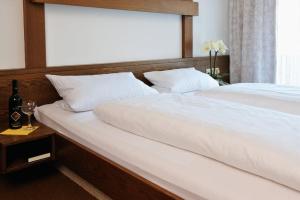 Postel nebo postele na pokoji v ubytování Hotel Pflug