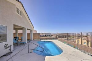 The swimming pool at or close to Sunny Bullhead City Home with Patio and Mnt View!