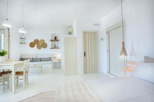 Ένα ή περισσότερα κρεβάτια σε δωμάτιο στο Lithos Villas