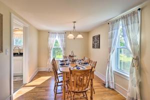 a dining room with a table and chairs at Finger Lakes Farm Retreat Walk to Wineries! in Hector +25 photos