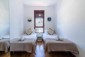 Posteľ alebo postele v izbe v ubytovaní Cliff Suite Las Canteras