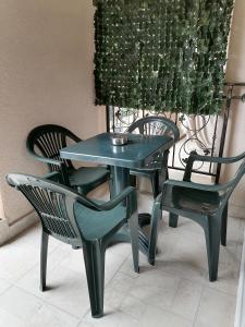 a table and two chairs and a table and chairs at Belisima 204 B in Ravda