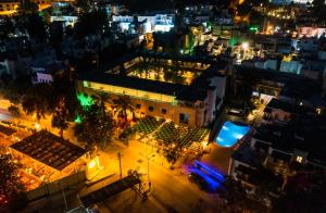 an aerial view of a city at night at Hotel Bleu Nuit in Bodrum City