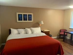 Säng eller sängar i ett rum på Beachway Motel