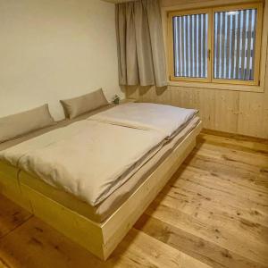 Ένα ή περισσότερα κρεβάτια σε δωμάτιο στο Wasserfall Apartment Waldblick
