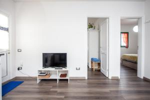 TV a/nebo společenská místnost v ubytování CASA IGNAZIA in Lajares