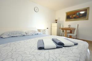 Postel nebo postele na pokoji v ubytování Homelike Retreat BUMA