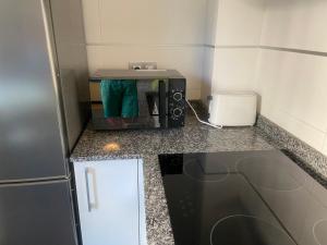 Kuchyňa alebo kuchynka v ubytovaní Fantástico Playa Lérez Riás Baixas 2