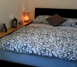 Voodi või voodid majutusasutuse Ric Apartment Budva toas
