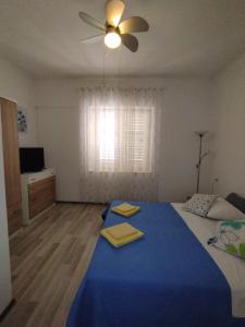 Postel nebo postele na pokoji v ubytování Apartman MajaS