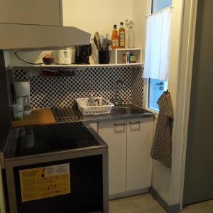 Kuchyň nebo kuchyňský kout v ubytování Espace Beléverte Bussière 1 Tamaris appartement meublé de 2 chambres