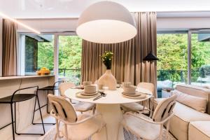 Posedenie v ubytovaní Apartament nad jeziorem Drwęckim Turystyczna # 17