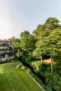Vonkajšia záhrada v ubytovaní Apartament nad jeziorem Drwęckim Turystyczna # 17
