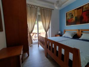 Кровать или кровати в номере FINI 2