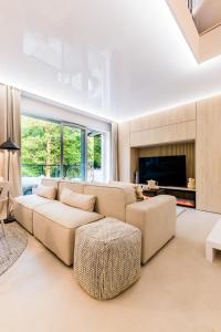 Posteľ alebo postele v izbe v ubytovaní Apartament nad jeziorem Drwęckim Turystyczna # 17