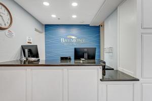 a bar in a dental office with a blue wall at Baymont by Wyndham Salida in Salida +54 photos