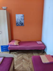 Postel nebo postele na pokoji v ubytování Eros Rooms