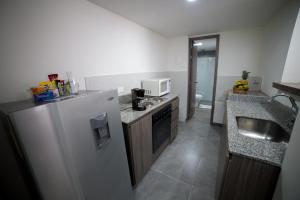Kuchyň nebo kuchyňský kout v ubytování Hotel Torre Poblado