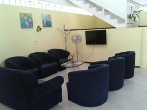 TV a/nebo společenská místnost v ubytování Hotel D'Anatureza