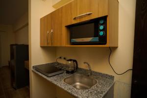 Η κουζίνα ή μικρή κουζίνα στο Florenza khamsin home Hurghada