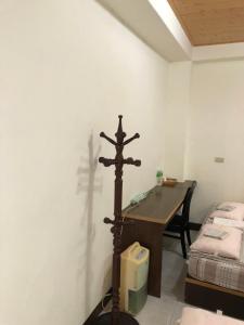 Postel nebo postele na pokoji v ubytování Dongyin Homestay連江縣民宿054號