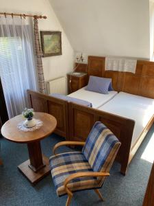 מיטה או מיטות בחדר ב-Penzion Country Club
