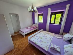 Postel nebo postele na pokoji v ubytování Apartment Dragone