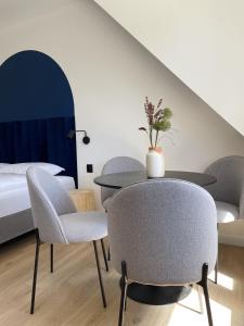Posteľ alebo postele v izbe v ubytovaní Dubois Apartments Kołobrzeg