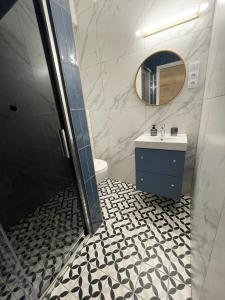 Kúpeľňa v ubytovaní Dubois Apartments Kołobrzeg