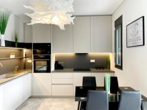 A kitchen or kitchenette at Luxury Apartment Nikiti Olea Valley