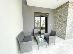 A seating area at Luxury Apartment Nikiti Olea Valley