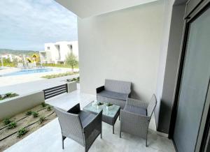 A seating area at Luxury Apartment Nikiti Olea Valley