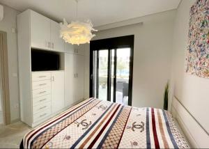 A bed or beds in a room at Luxury Apartment Nikiti Olea Valley