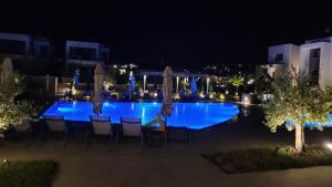The swimming pool at or close to Luxury Apartment Nikiti Olea Valley